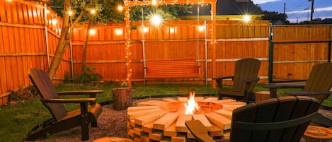 Cozy up next to the fire pit while making smores with your family or friends! 