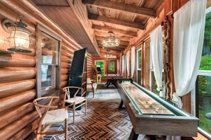 Game room with shuffleboard, air hockey and arcade