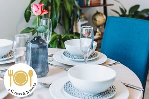 Dining area with seating for 4 guests plus highchair.