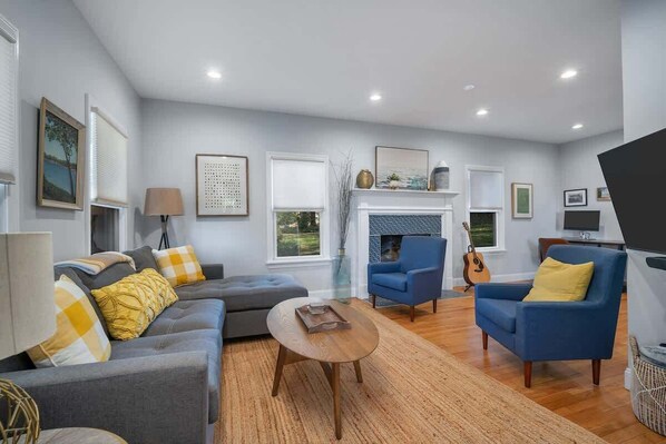 The living area with all new furniture and ample guest seating