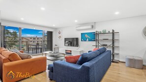 Living Room with Balcony Access