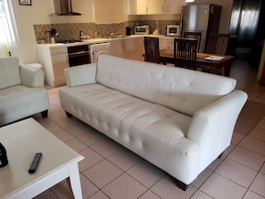Living room with open kitchen