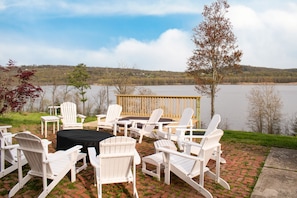 Firepit with plenty of seating and views of the Hudson River.