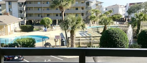 Large balcony over looking 2 pools plus a baby pool