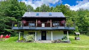 The chalet features a massive 2000 sq ft wraparound deck