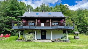 The chalet features a massive 2000 sq ft wraparound deck