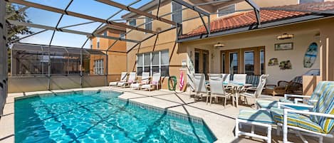 Large pool deck with plenty of seating