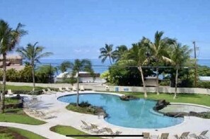 Beautiful heated pool and jacuzzi overlooking the ocean.