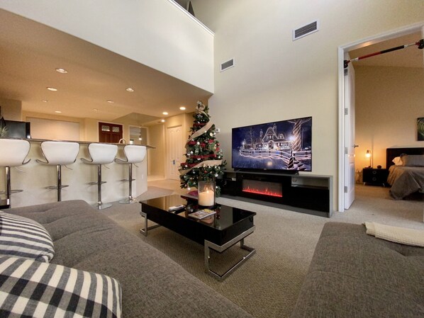 Spacious family room with plenty of seating for the entire family and guests. 