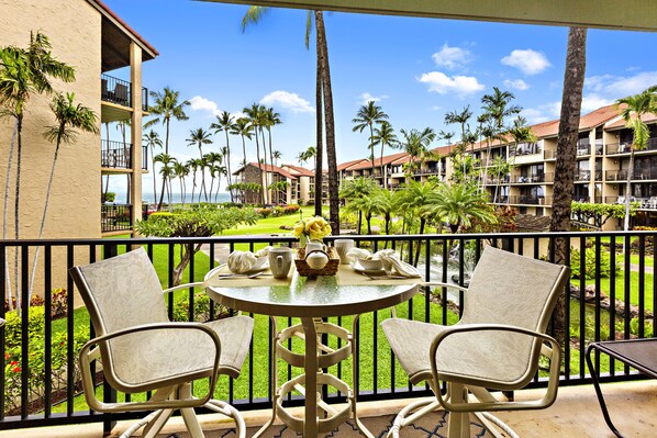 Lush Hawaiian scenery and the ocean in the background from the lanai