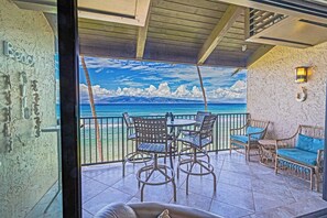 Cosy sitting with a drink/book.  Molokai in the distance