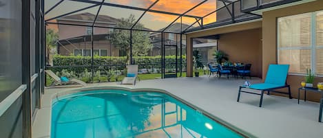 Private heated pool with oversized pool deck