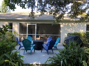 Fire pit on the back patio, right outside the lanai. 