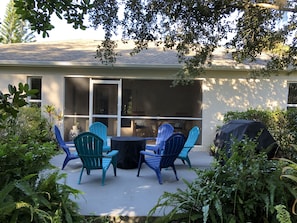 Fire pit on the back patio, right outside the lanai. 