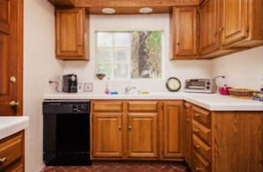 Fully equipped kitchen.  Gas Stove, microwave, fridge, dishwasher, washer/dryer