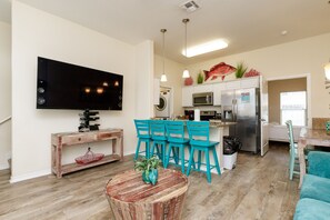Thoughtfully designed open layout combining the living, kitchen, and dining areas
