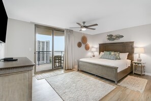 Primary Bedroom - Primary bedroom with king sized bed, access to the balcony and a fantastic remodeled ensuite!