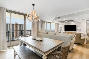 Dining Area - Open dining area with access to the balcony.