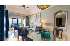Living room with 2 murphy beds.  Beds are in the upright position. 