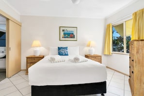 Master bedroom with queen-size bed, a good size ensuite and ocean view from the bed