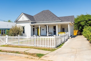 This charming home is wrapped in nature's embrace, ready to welcome you to your happy place.