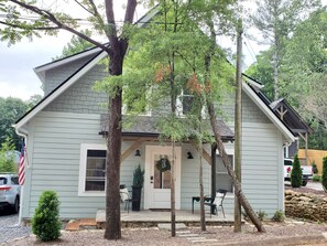 Summer view of 534 Fisher Road with comfy chairs.  Friendly neighbors!