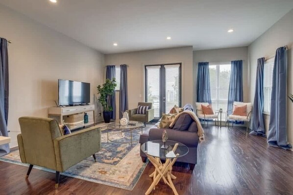Spacious living room with comfortable seating for the whole group