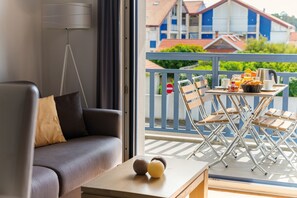 Comfortable seating area. Unit may feature furnished balcony or patio
