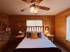 Bedroom 1 w/ Queen Bed and attached bathroom- Located on Main Level