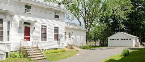 Side of house, driveway, and garage
.
