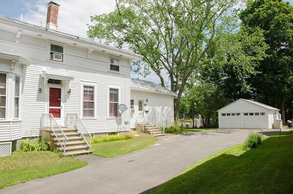 Side of house, driveway, and garage
.
