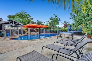 Relax under Florida sun or enjoy other activities on the backyard