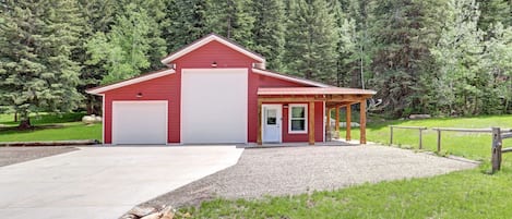 The Barn- front of cabin and garage in summer