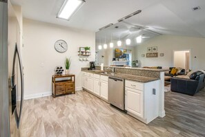 Spacious kitchen with granite counter tops