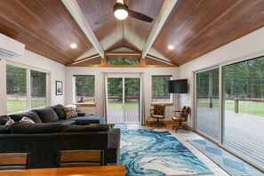Large doors to massive deck (patio furniture provided in warm weather)