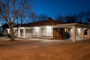 Oakwood Manor lit up at night can serve as your beacon home from the Track and Casino.