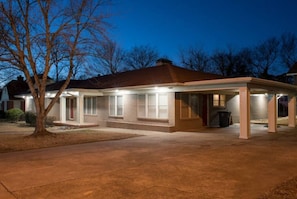 Oakwood Manor lit up at night can serve as your beacon home from the Track and Casino.