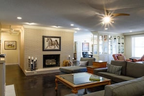 The living room have plenty of comfy seating for the whole gang to gather.