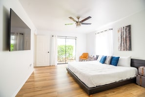 Bedroom #1: Unwind on the king sized bed in the primary bedroom.