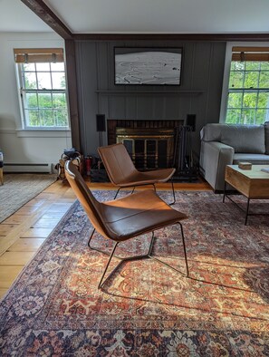 Updated living room is ideal for relaxing by the fire, taking a nap, laughing...