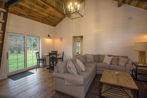 Living room in the new addition.  Far door in shot leads to double bunk room.  