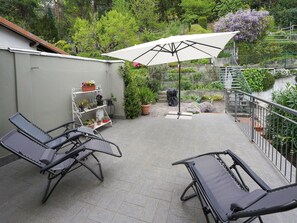 Plant, Furniture, Outdoor Furniture, Shade, Building, Tree, Leisure, Real Estate, Outdoor Table, Tints And Shades