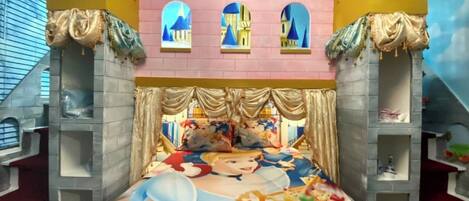 Bedroom 4: Upper level: Enchanting Cinderella suite featuring custom built in bunk bed with dual staircase . Twin over queen bed |Smart TV | Dresser | Closet. En-suite Jack&Jill bathroom. 