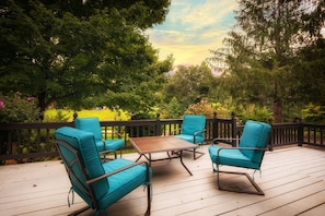 Front porch with comfortable seating and relaxing setting.