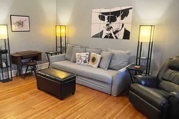 Chic living room. Plenty of comfy space to hang out with friends, watch TV or read a book.