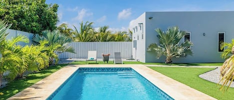 Dive into paradise with your large private pool, perfect for cooling off under the Caribbean sun or enjoying a refreshing evening swim.