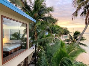 Panoramic bedroom window overlooking the lagoon