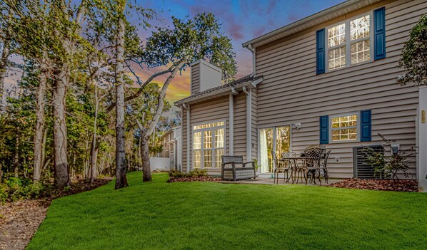 Property surrounded by nice grove of tall trees