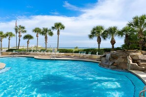 Beachside freeform heated pool w/ waterfall and hot tub. Gated access, restroom.