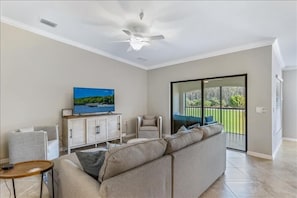 Living Room w/ a View out onto the Rear Lanai